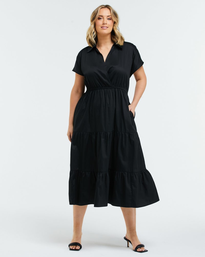 Front of a model wearing a size 2X Louise Tier Dress in Black by Estelle. | dia_product_style_image_id:264592